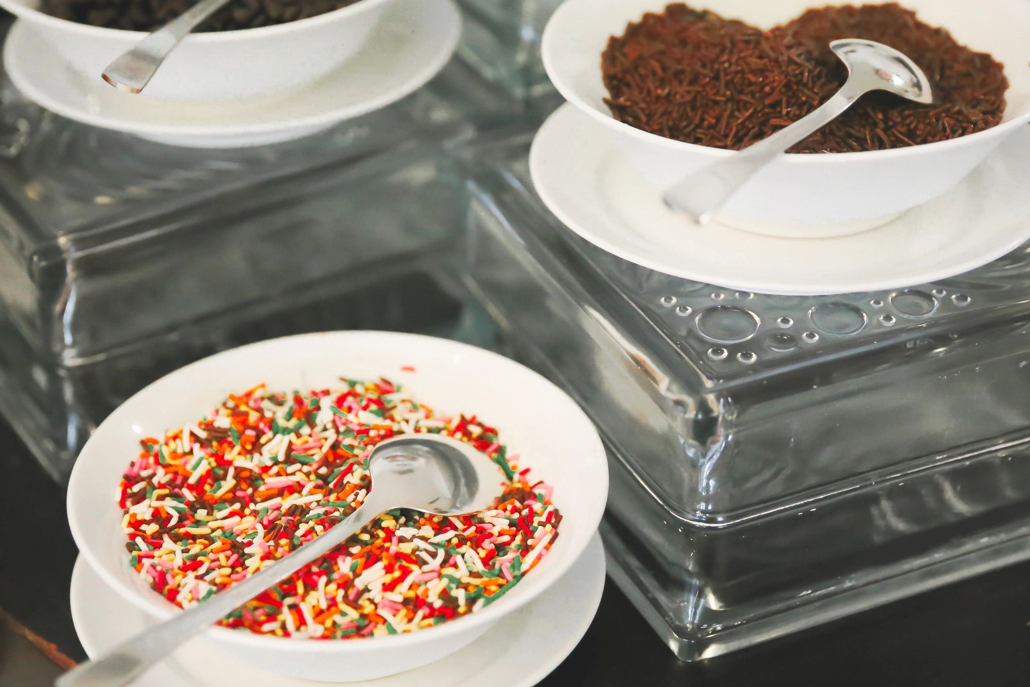 Bowl of colorful sprinkles close up